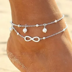 Tradera Fotlänkar<23 cm 28 cm Fotsmycke Fotlänk Ankellänk Fotkedja pärlor infinity silver färg