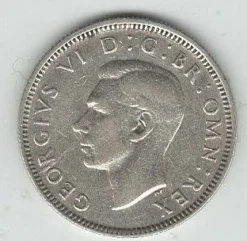 Tradera 1 st England, Silver-mynt. Valör One Shilling. år 1943!^ Utländska Mynt