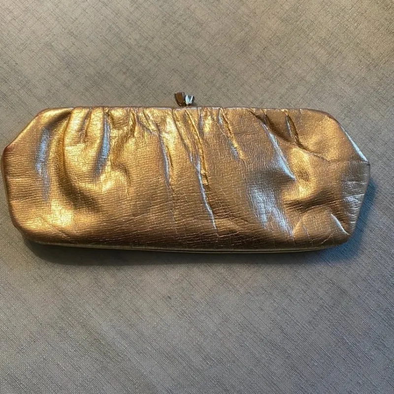 Tradera Aftonväska (clutch) i guldfärgat skinn, 50-tal> Väskor