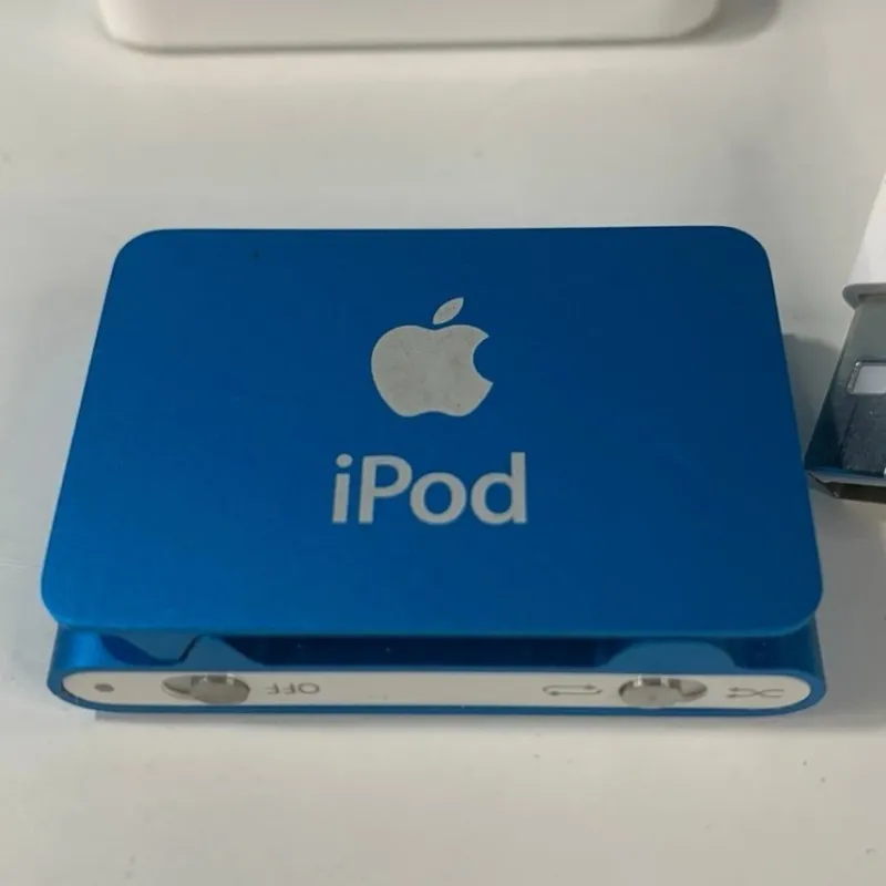 Tradera Apple iPod Shuffle A1204 blå - 2nd Generation^ Mp3 & Mp4-spelare