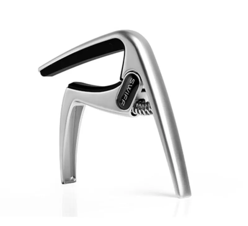 Tradera capo för gitarr SWIFF K8^ Musikinstrument