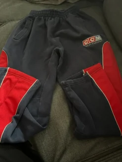 Tradera Hockey & Skridskor<Ccm hockey byxor blå /röd stl 140-150