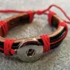 Tradera Smyckestillbehör<Coolt Snap-on armband som du kan variera genom att knäppa på olika knappar !