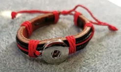 Tradera Smyckestillbehör<Coolt Snap-on armband som du kan variera genom att knäppa på olika knappar !