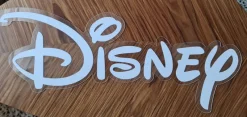 Tradera Disney logotyp - Plast^ Disney