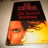 Tradera EN HOTAD KVINNA --- LISA SCOTTOLINE> Skönlitteratur