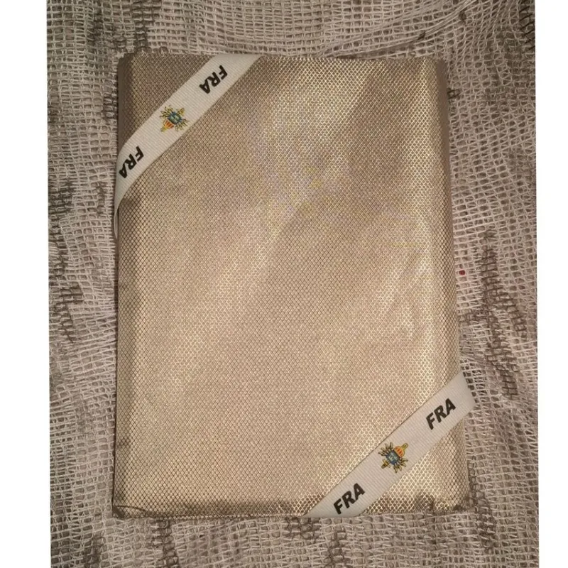 Tradera Faraday-tyg -> Fyrskikts komposit med hybrid silvet metall-polymerstruktu^ Amatörradio