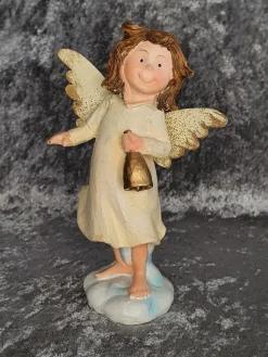 Tradera Samlarfigurer<Flicka med vingar / Ängel, med en klocka i handen