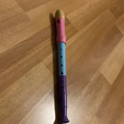 Tradera flöjt i rosa, blått och lila> Leksaksinstrument