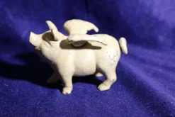 Tradera Sparbössor<Flygande spargris i gjutjärn