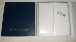 Tradera Fotoalbum-Dop-Läder.8 foton. Oanvänt. I nyskick.^ Fotoalbum