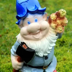 Tradera Trädgårdsdekorationer<Gipsfigur av en tomte skogshuggaren (blå)