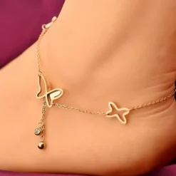 Tradera Fotlänkar<Guld Fotsmycke Fotlänk Ankellänk Vristlänk Fotkedja - Fjäril & Vita Stenar