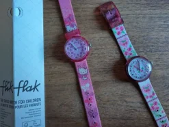 Tradera Hello Kitty + en till.. Flik flak schweiziska armbandsur för barn.^ Barnklockor