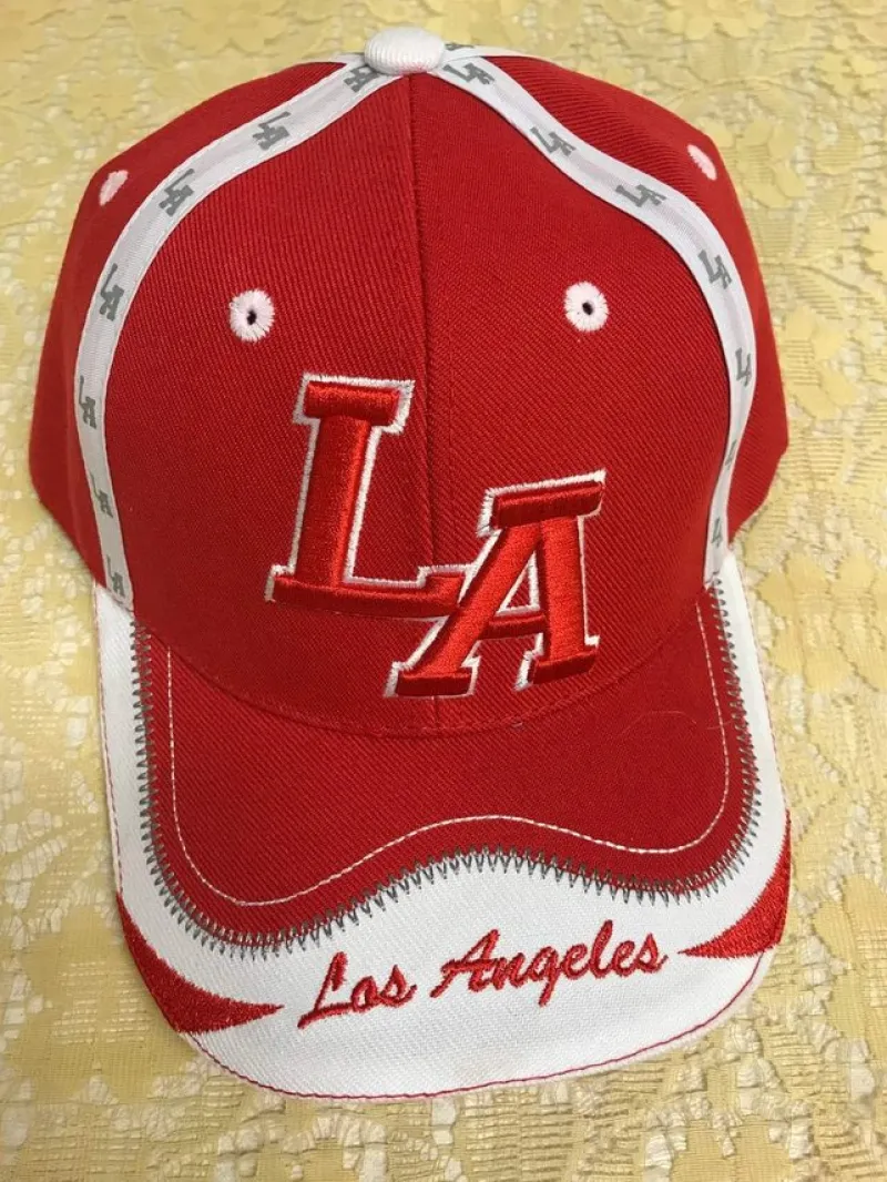 Tradera LA Broderi Keps> Huvudbonader