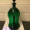 Tradera Äldre Kluckflaska, troligen Holmegaard, Danmark. Grön glasmassa.> Glas