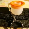 Tradera Nyckelringar<Äldre Tupperware Nyckelring Bringare med Mått & Orange Lock - Fint skick !!