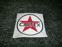 Tradera ÄLDRE TYGMÄRKE CALTEX^ Bensinia