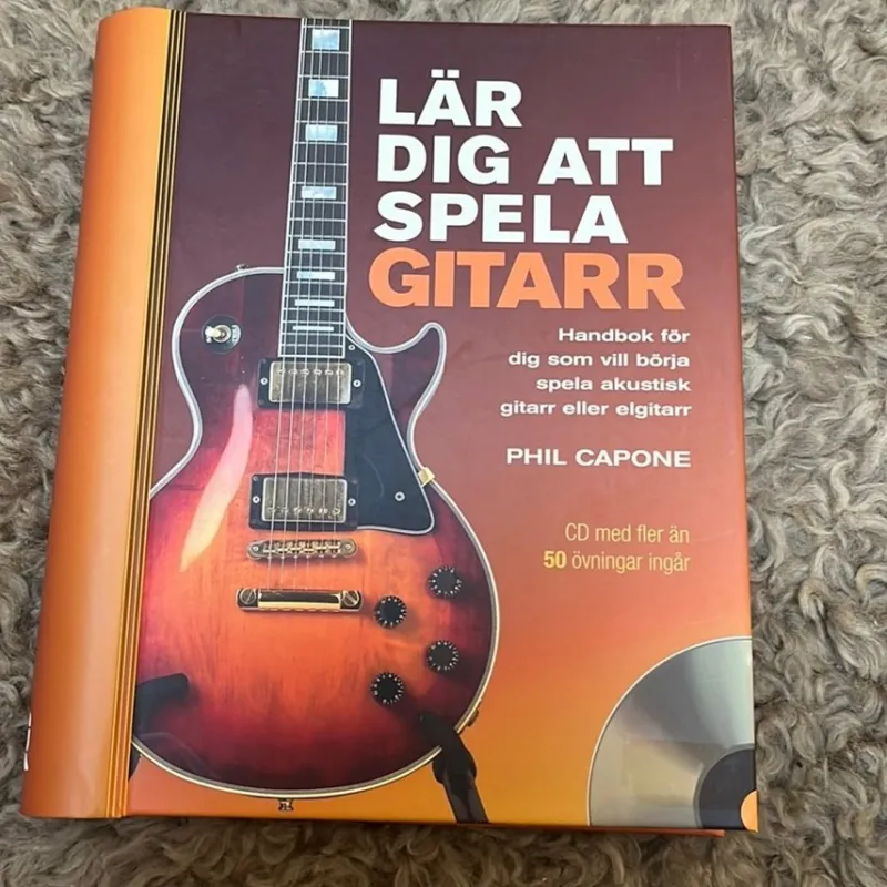 Tradera Lär dig att spela gitarr - Phil Capone> Musik, Visor & Vistryck