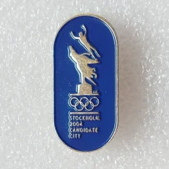 Tradera Olympia<Metallmärke för OS-ansökan Stockholm 2004 - blå bakgrund