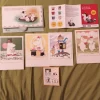 Tradera Övriga Samlarsaker<Mumin vykort 4 st oskrivna, stämplade frimärken, d:o mapp, folder för stämplar.