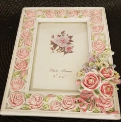 Tradera NY. Fotoram med rosor.^ Ramar