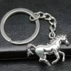 Tradera Nyckelring. Galopperande. Häst. Metall. Silverfärgad.> Nyckelringar & Nyckelfodral