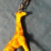 Tradera Nyckelringar<nyckelring GIRAFF plast ca 4x6,5 cm