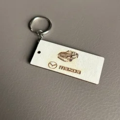 Tradera Nyckelring med Gravyr i ljust trä - Mazda miata^ Merchandise