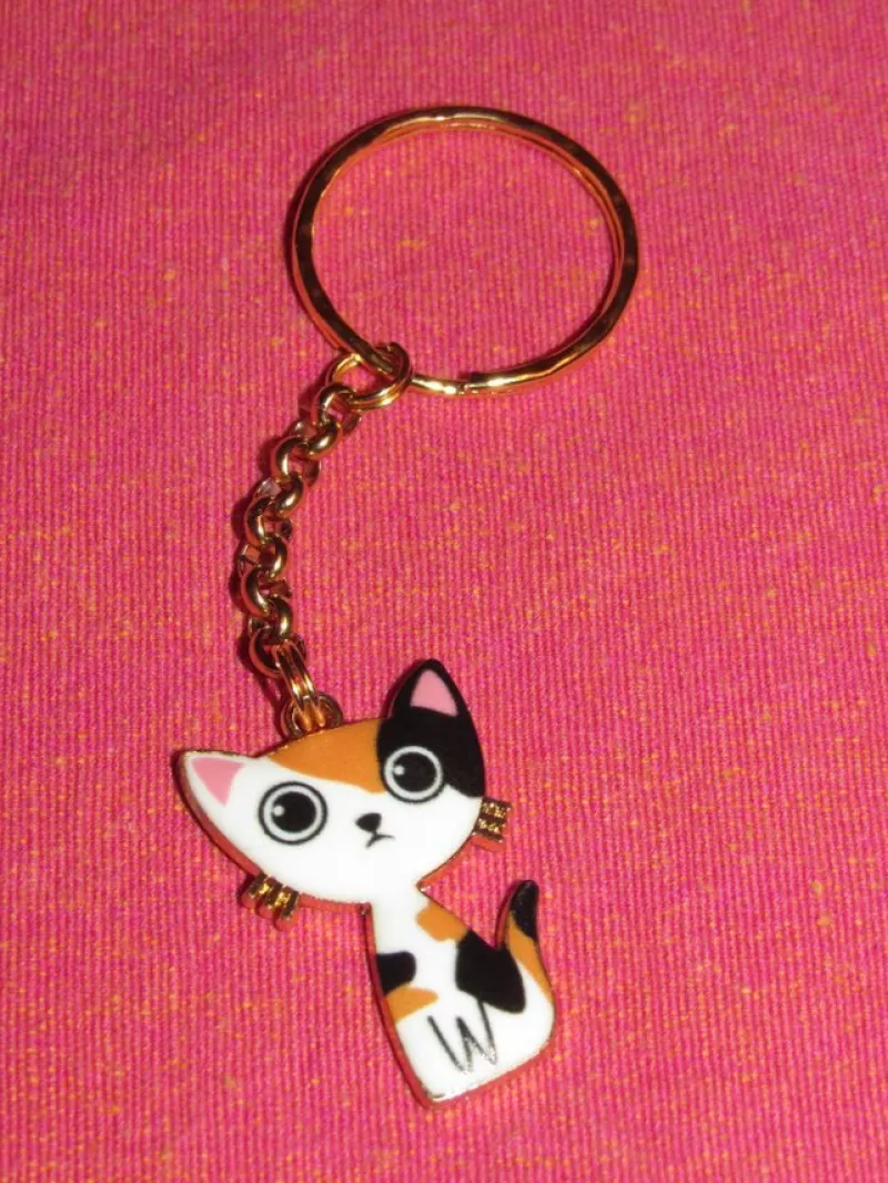 Tradera Nyckelring med katt av emalj/zinklegering/rostfritt stål.^ Accessoarer