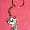 Tradera Nyckelring med katt av emalj/zinklegering/rostfritt stål.^ Accessoarer