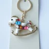 Tradera Nyckelring/Väskdekoration Guld Rocking Horse med Kristaller> Nyckelringar & Nyckelfodral