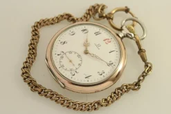 Tradera Omega Röd 12:a fickur från 1912 - Med fickurskedja och skinnfodral^ Fickur