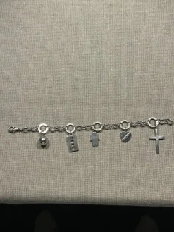 Tradera Armband<OXXO armband med berlocker