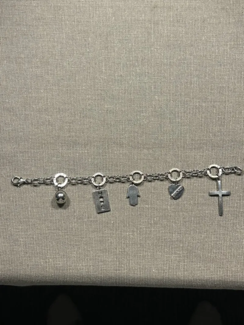 Tradera Armband<OXXO armband med berlocker