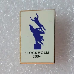 Tradera Olympia<Pin: Metallmärke för OS-ansökan Stockholm 2004 - vit bakgrund