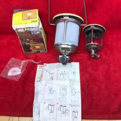 Tradera Technica & Nautica<Primus 2171 Petroliumlampa med originalförpackning med en till större modellen.