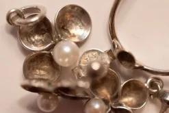 Tradera Smyckespaket<Pärlset med silver konsthantverk örhängen hänge och ring pärlor