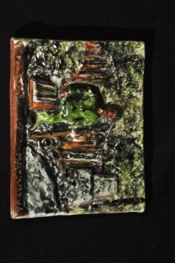 Tradera Relief i keramik med lasyr^ Reliefer