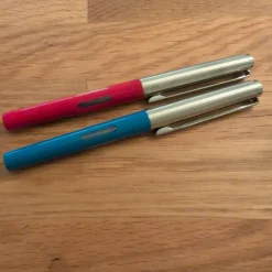 Tradera Pennor & Tillbehör<Reservoarpennor pellicano röd och blå