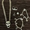 Tradera Smyckespaket<Smyckespaket, döskalle halsband, snö of sweden armband mm
