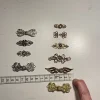 Tradera Spännen, 10 par, mixade. Sömnad, kläder, kofta, lajv, medeltid^ Hobbymaterial