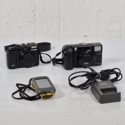 Tradera 2st kameror, batteriladdare & GPS - Canon G10 - Minolta - Garmin^ Fotokameror