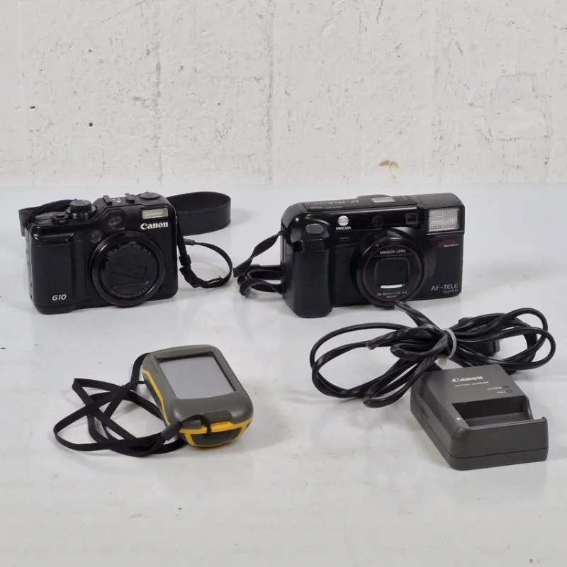 Tradera 2st kameror, batteriladdare & GPS - Canon G10 - Minolta - Garmin^ Fotokameror