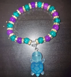 Tradera Armband<Söt Sköldpadds-Armband med Lila och Turkos Pärlor