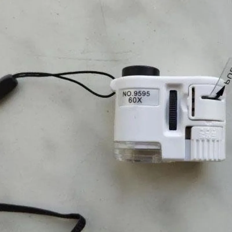 Tradera 2st 60X justerbar fickmikroskop med sedeldetektering/ficklampa funktion^ Mikroskop