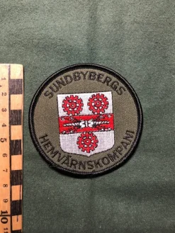 Tradera Militära Samlarsaker<Sundbybergs Hemvärnskompani Tygmärke