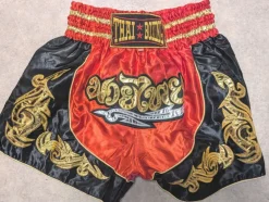 Tradera Kampsport<Thailändska boxningshorts, storlek XL, röda med gulddetaljer