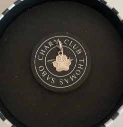 Tradera Armband<Thomas Sabo charm / berlock, tassavtryck / paw med cubic zirconia stenar.