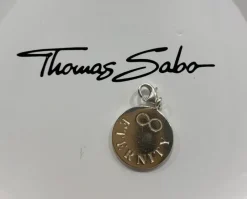 Tradera Armband<Thomas Sabo charm / berlock, rund platta med texten Eternity.